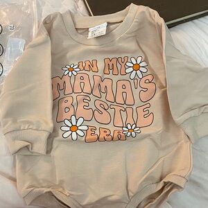 Cute Beige Baby Onesie with Floral Print